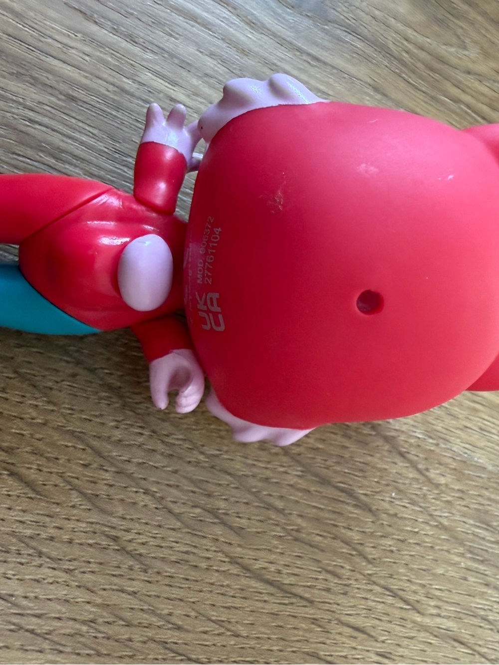 Source Unknown Red and Teal Kids Character Figure